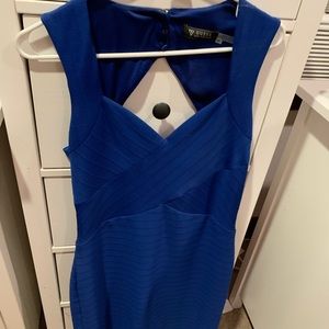 Royal blue cocktail dress just above the knee.